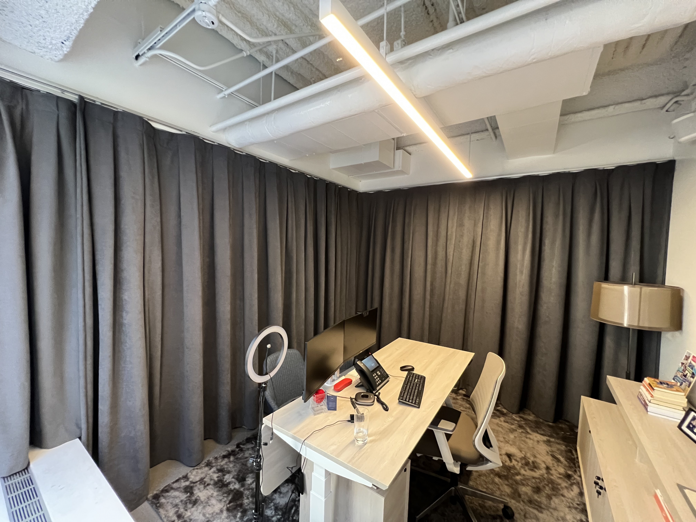 L Shaped Curtain In CEO's Corner Office