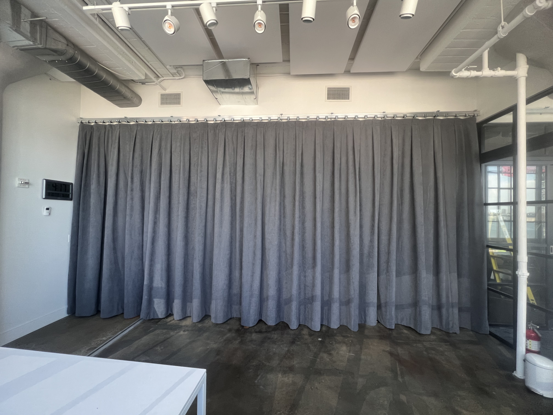 Large Grey Acoustic Curtain and White Ceiling Panels in Photography Studio
