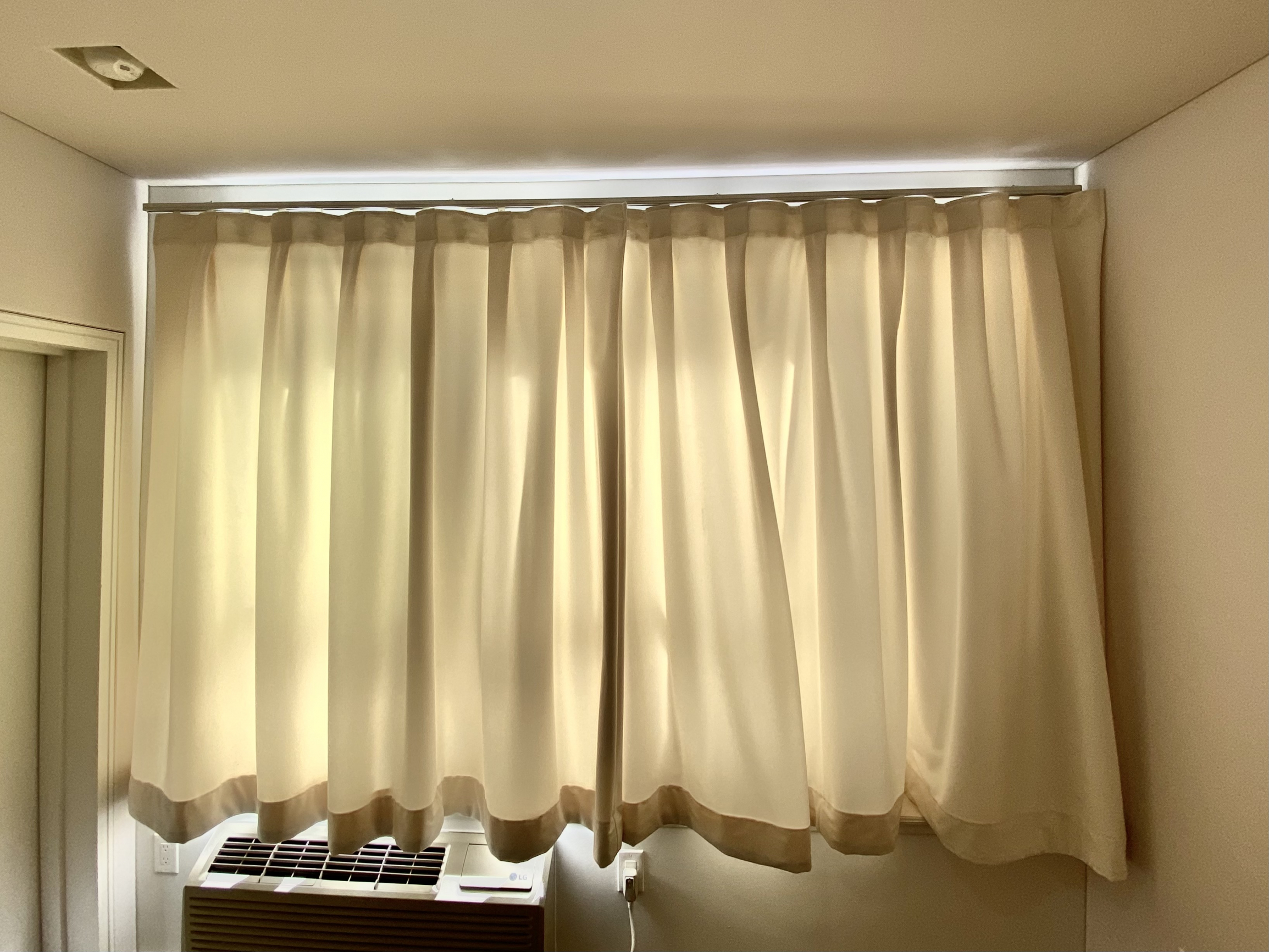 White Acoustic Light-Filtering Curtain in Piano Room